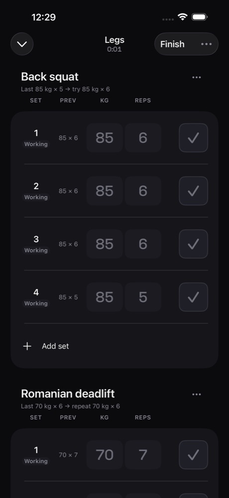 Active workout screen showing set rows with SET, PREV, LB and REPS columns and a tick button per row